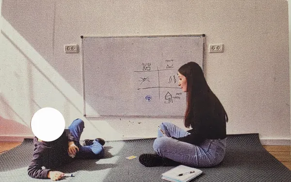 שירה רקיר קרגיצ'וב בטיפול עם ילד